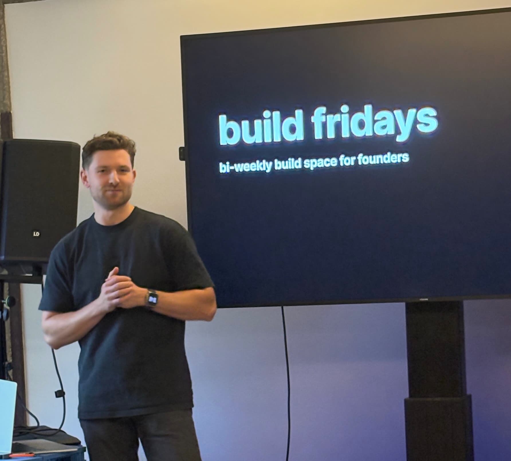A builder presenting at build fridays